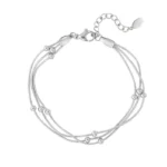 Armband met een twist, Armband, stainless steel, 16 + 3 cm, met bolletjes, zilver kleurig