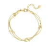 Armband met een twist, Armband, stainless steel, 16 + 3 cm, met bolletjes, goud kleurig