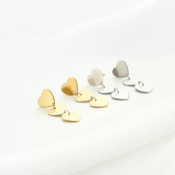 Oorbellen hartjes, stainless steel, 3 hartjes, 3 bij 1 cm, goud en zilver kleurig,