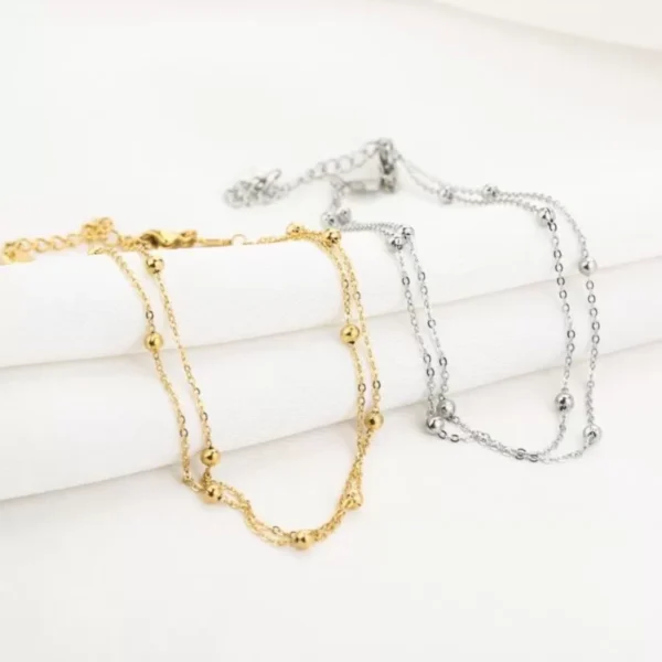 Dubbel enkelbandje, enkelbandje, met balletjes, stainless steel, 22 + 4 cm, goud en zilver kleurig